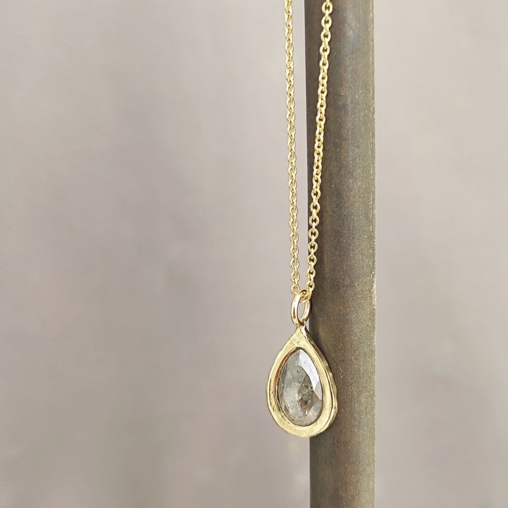 14 Karat solid yellow gold double necklace, with wild drop shape0.68ct  diamond
